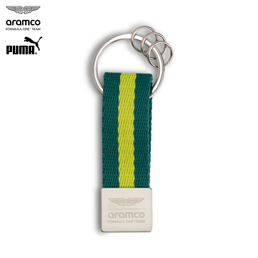 701238098001801_aston_martin_f1_team_official_merch_puma_fuelforfans_f1store_formula1_formel1_f1sweden_westcoast_motorsport_key_ring_nyckelring