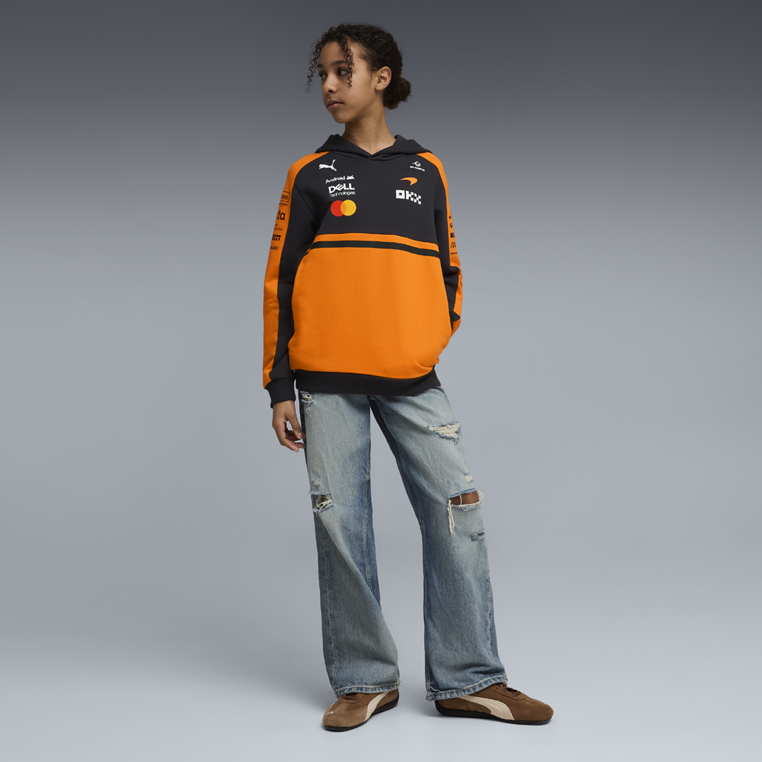 701241089_mclaren_racing_replica_team_hoodie_sweatshirt_f1_formel1_formula1_official_merch_f1store_fuelforfans_puma_westcoast_motorsport_girl