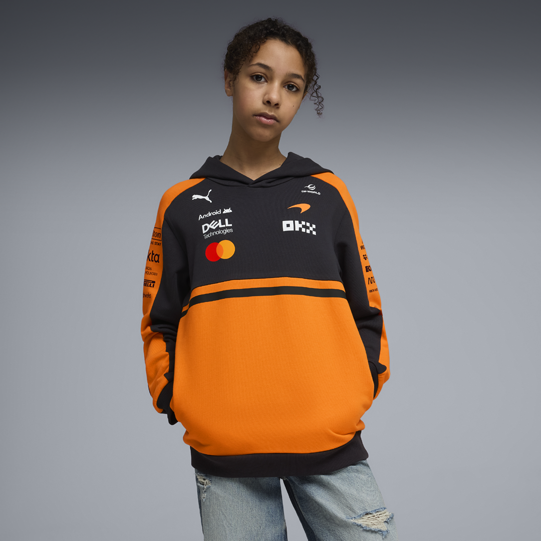 701241089_mclaren_racing_replica_team_hoodie_sweatshirt_f1_formel1_formula1_official_merch_f1store_fuelforfans_puma_westcoast_motorsport_girl_face